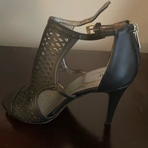 Black heels with strap.